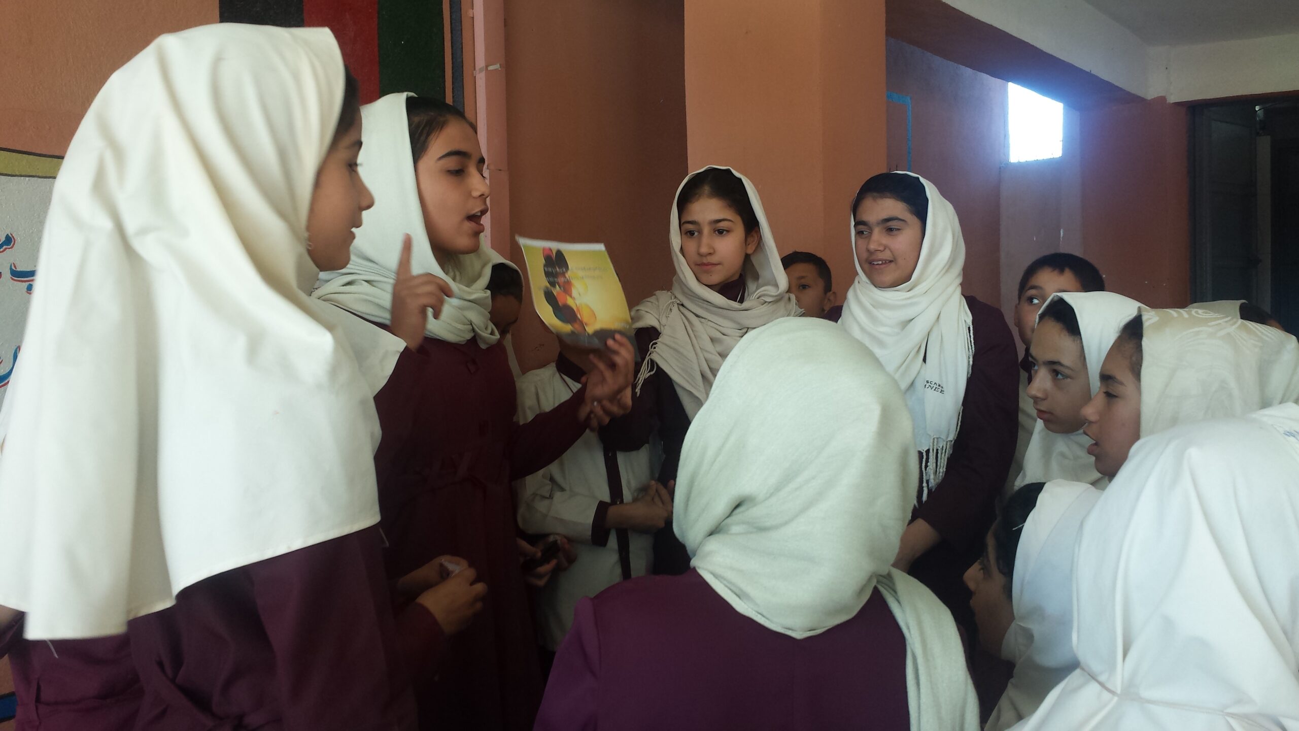 Female Afghan students making a presentation