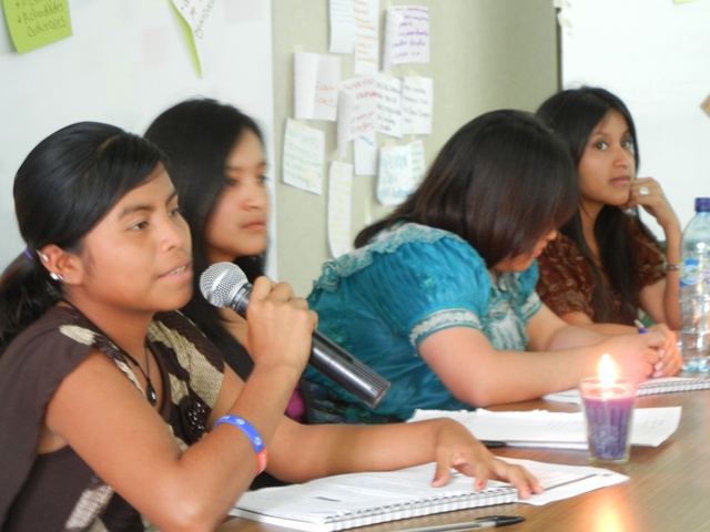 Young indigenous woman with microphone